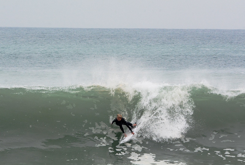 Surfer at Zuma Beach