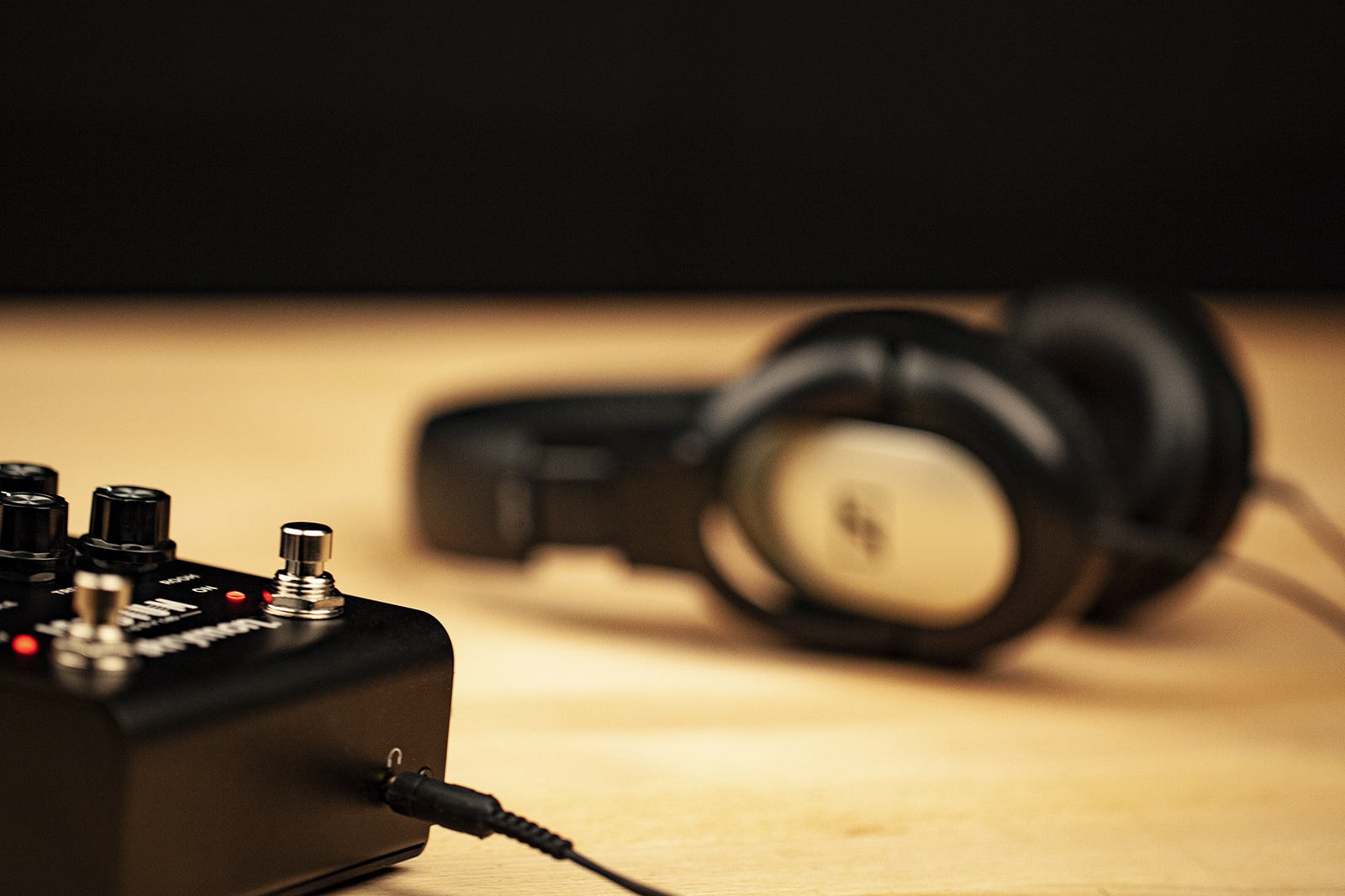 Strymon Iridium being used with a set of headphones.