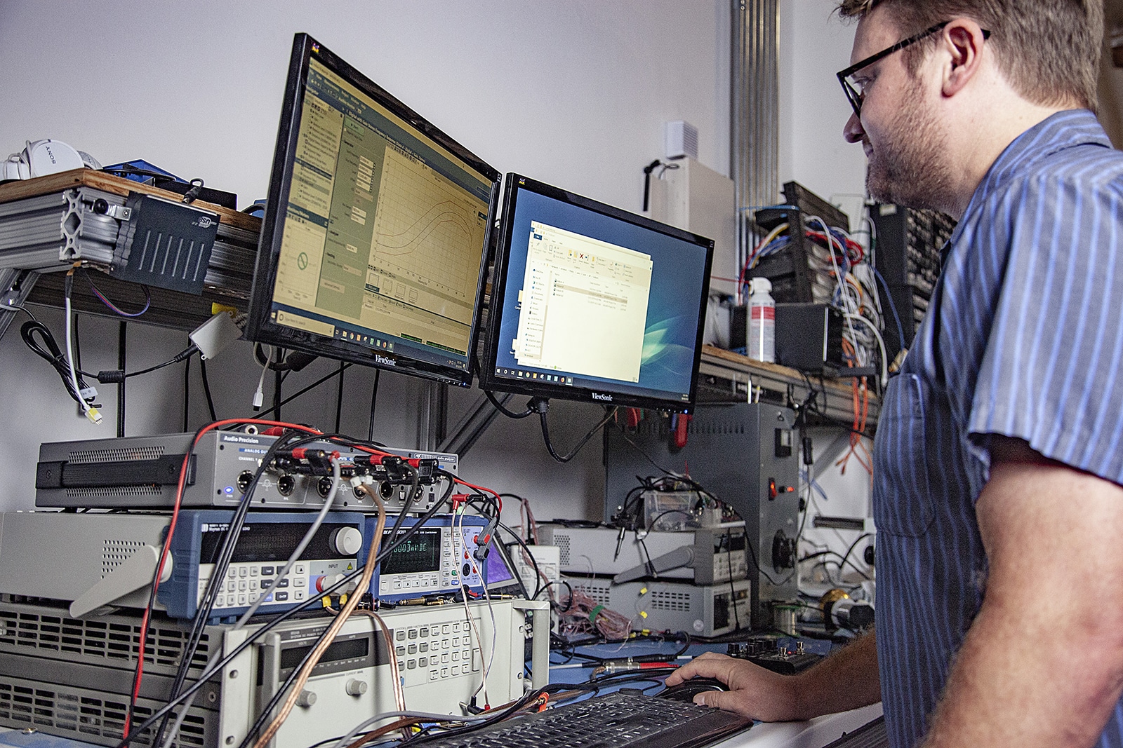 Electrical Engineer Josh Forbes working on Iridium.