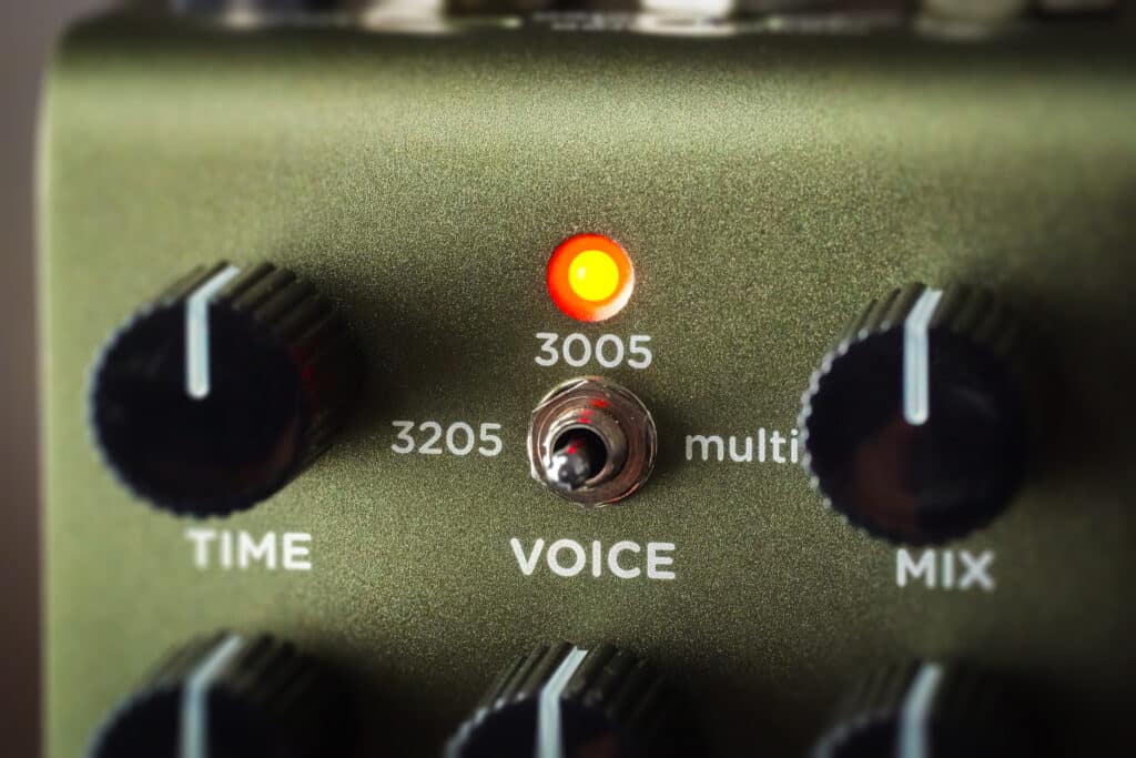 Closeup of Brig's VOICE switch with '3205', '3005', and 'multi' delay options