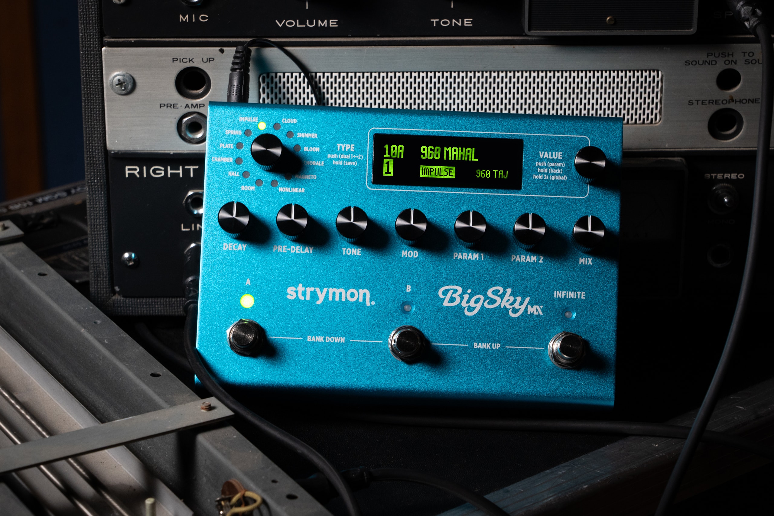 BigSky MX resting over an old, rustic spring reverb module.