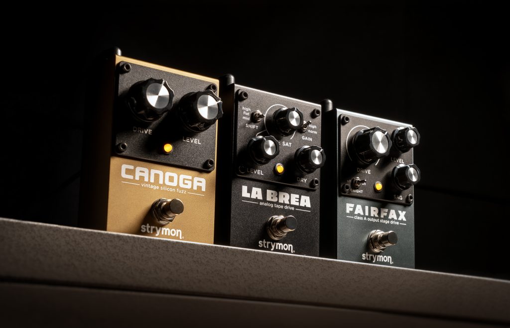 Strymon Series A pedals standing in a row next to one another.