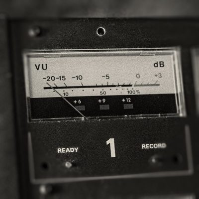 Closeup black and white photo of VU meter.